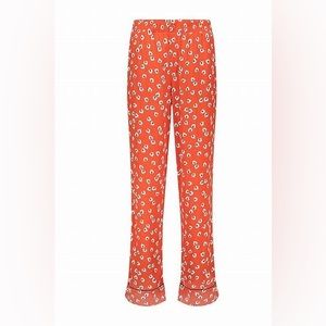 Ganni silvery floral-print crape straight leg pants.